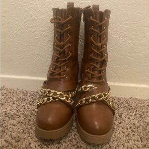 Brown high heel boots with gold chain